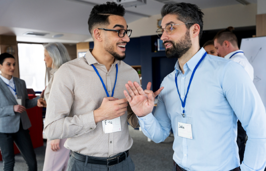 Two People talking at an event
